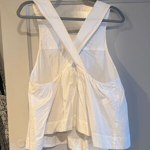 2 for 1! 1-White and 1-Black Cross-Back Top swing tank tops. Good crisp fabric!!